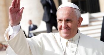 A Message From Dr. Jane Goodall on the Passing of Pope Francis Pope Francis smiles slightly and waves